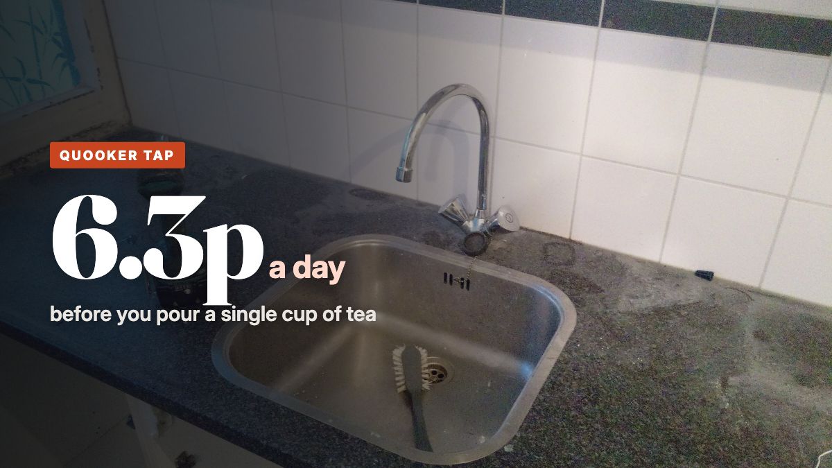 A chrome swan neck kitchen tap over a stainless steel sink in a flat