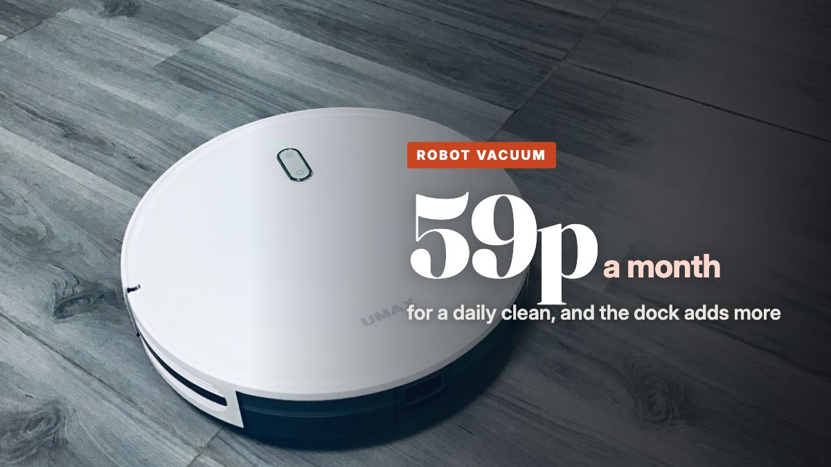 A white robot vacuum on a grey wood-effect laminate floor